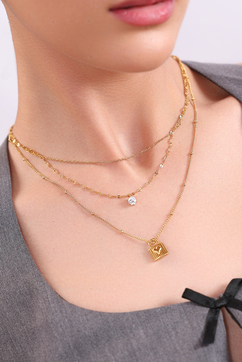 Layered with the Love Letter Necklace