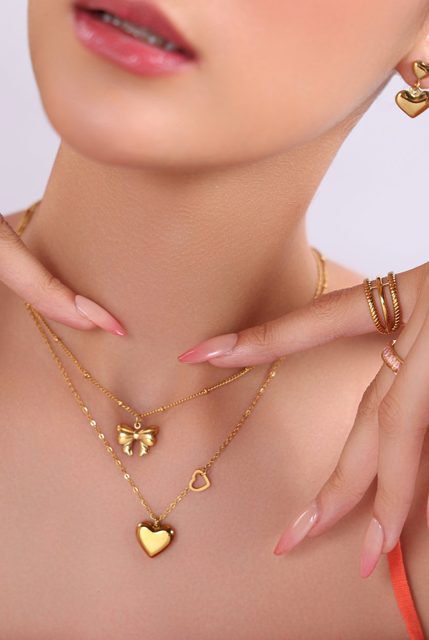 Layered with our Take A Bow Necklace